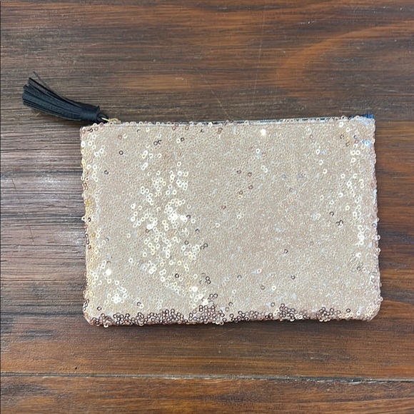 ipsy Handbags - Ipsy Gold and Black Sequin Clutch with Tassel
